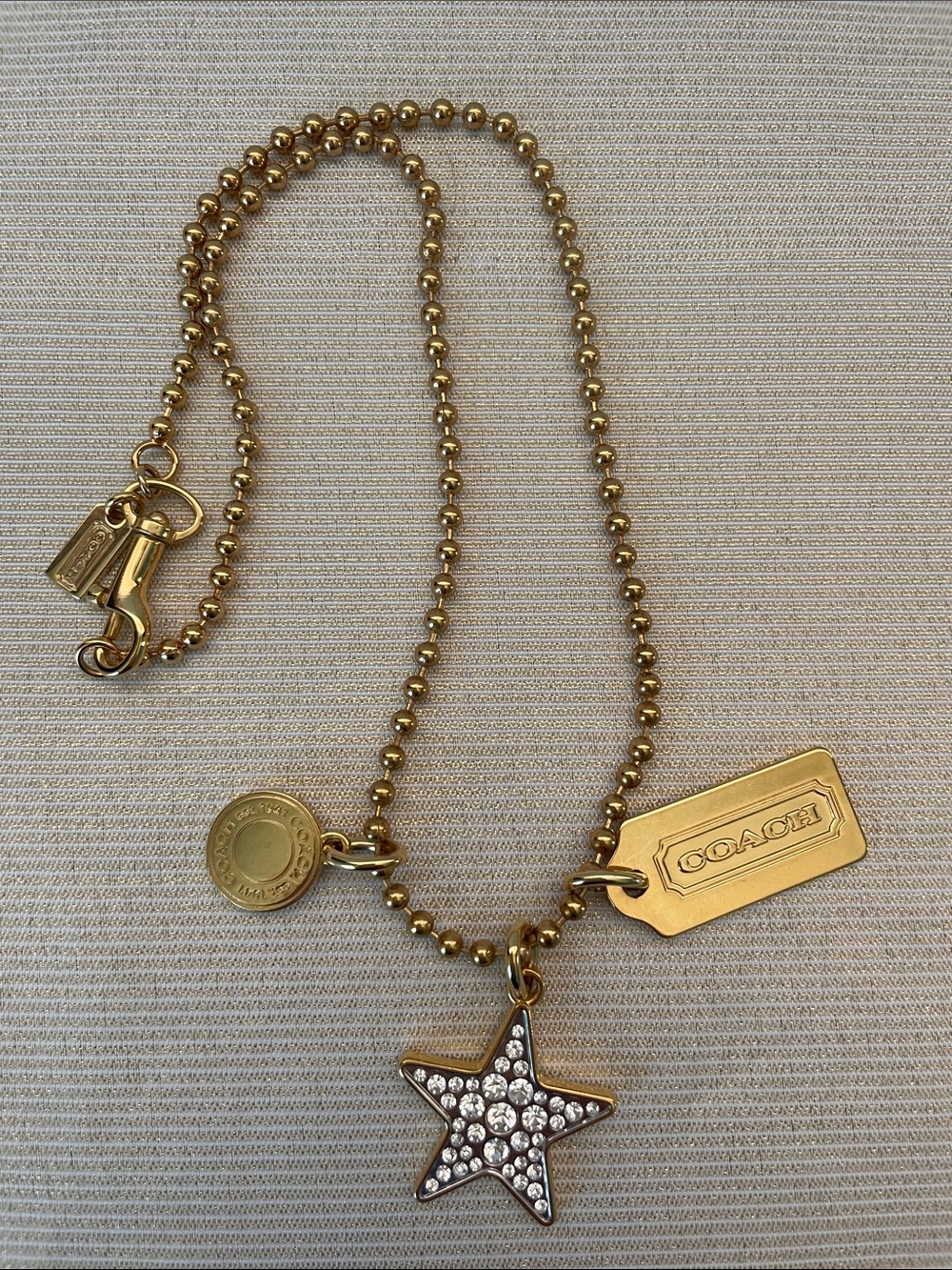 Coach Gold-Tone Crystal Star Pendant Necklace